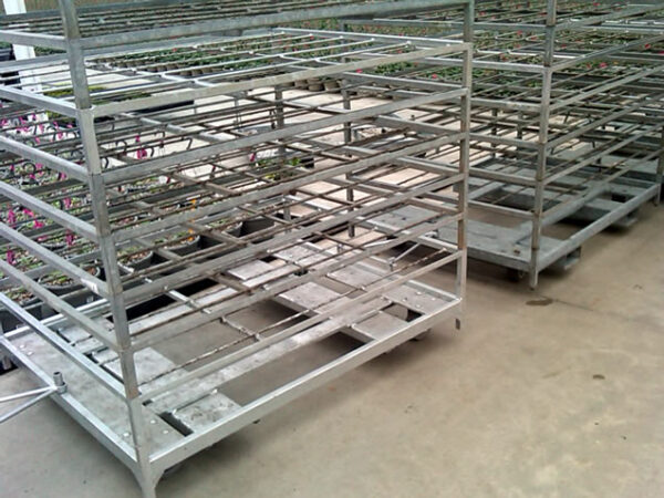 Racks, assembled into carts in staging area, waiting to be loaded